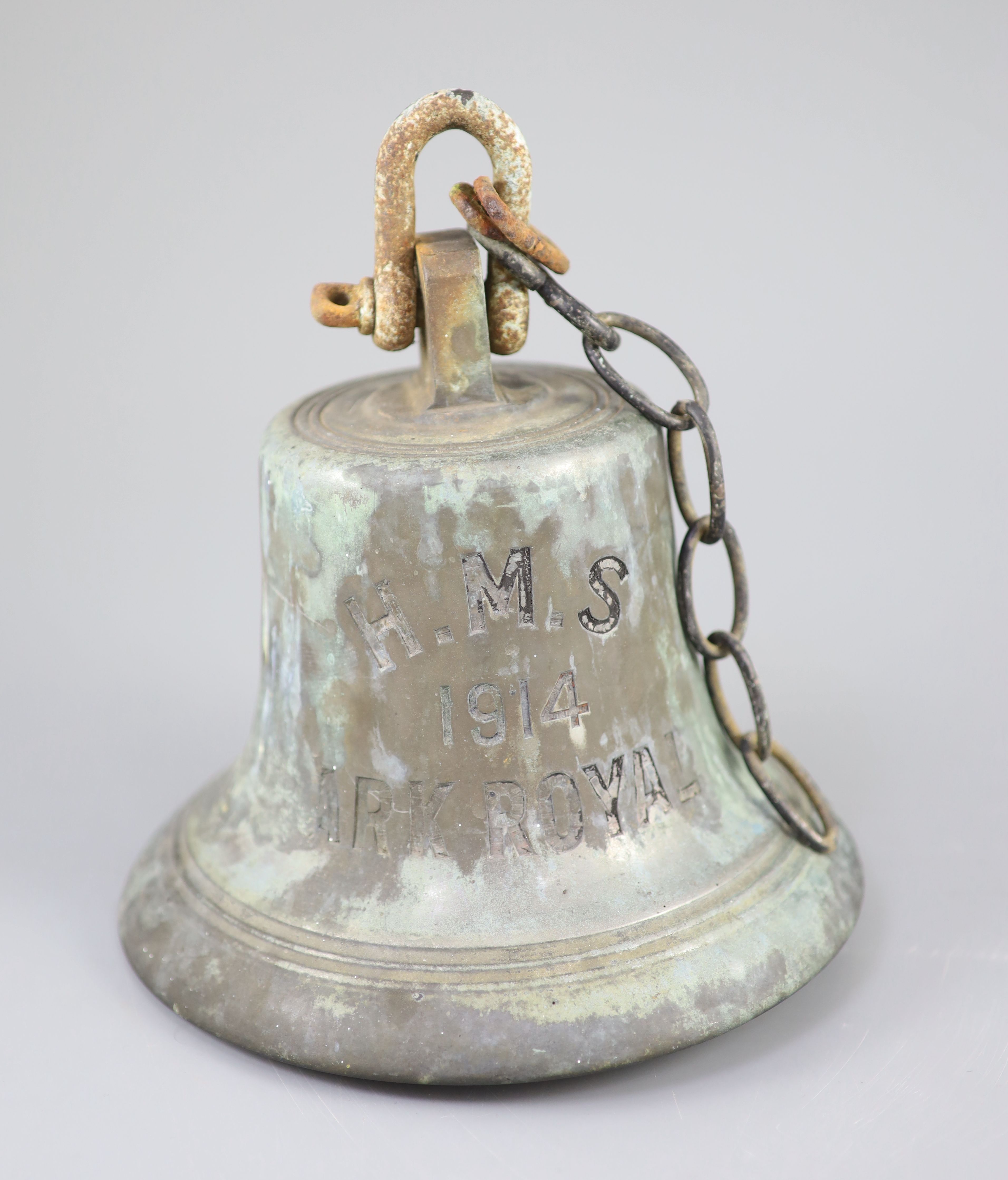 A bronze ships bell from the 1914 HMS Ark Royal, retaining its original clanger, height 8.25in. diameter 8.25in.